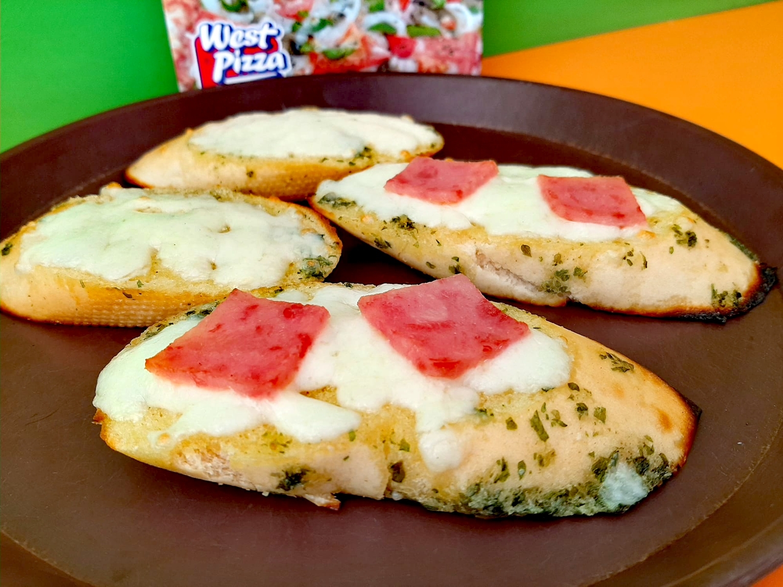 Panes de ajos con queso y jamón